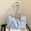 Bolsa de Hombro Cruzada Verano 2026 Nueva Versátil Moda Nicho Diseño Alto Gama Viajero Cotidiano Exquisita Hombro Debajo del Brazo Tote