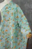 Tela jacquard floral pequeña tridimensional repujada estilo chino para chalecos, elegantes faldas cheongsam y materiales decorativos para trajes