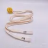 Suministro directo de fábrica cuerda plana hueca para sombrero suéter pantalones cuerda de algodón tejida pantalones de cuerda de algodón cuerda para sombrero 1.2 cm cinturón de cuerda de algodón bordado