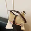 Bolso tejido para mujer para exportación, nueva colección primavera 2026, bolso de mano retro de paja moderno y a la moda, bolso de hombro de gran capacidad para mujer