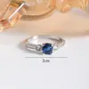 Nuevo producto más vendido transfronterizo europeo y americano: anillo de mujer de zircón azul de lujo, joyería de estilo minimalista exquisito, venta directa del fabricante