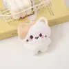 Novo chaveiro de pelúcia do Gato KT com blocos de cor, pingente fofo de gato de pelúcia, decoração de bolsa, acessório de presente