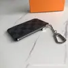 Tarjetero Moderno, Fácil de Llevar al Salir, Tarjetero con Cremallera de Cuero de Alta Gama, Adecuado para Llaves, Portatarjeta de Identificación, Estilo con Gancho de Metal