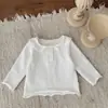 INS otoño e invierno bebé tejido fino muñeca solapa manga larga top bebé niña tapeta interior camiseta base