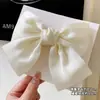Acessório de Cabelo Presilha com Laço Grande de Cetim Preto Feminino 2024 Novo Clipe de Trás Cartões de Cabelo Outono e Inverno Cyber Celebridade