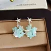 Pendientes de Borla de Concha de Estrella de Mar Azul Verano 2026 para Mujer, Pendientes de Botón de Gama Alta de Nicho, Estilo Pendiente de Vacaciones en la Costa