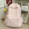 Mochila nueva de estilo japonés ins de alta apariencia, fresca y dulce, color caramelo con lazo, para estudiantes de secundaria y preparatoria, bolsa ligera de doble hombro