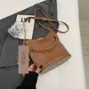 Bolso de diseño único para mujer, nueva colección 2026, alta calidad, bolso cruzado versátil, popular bolso tote y de hombro