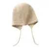 Cachemira Otoño/Invierno 2026 Nuevo Sombrero de Punto Casual de Moda Cálido de Color Sólido para Mujer de Gama Alta con Cordones y Protección para las Orejas