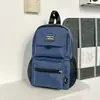 Mochila minimalista de trabajo ligero estilo japonés con múltiples bolsillos para parejas, adecuada para compras diarias, actividades al aire libre y deportes transfronterizos, bolsa cruzada