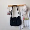Bolsa Tote Versátil de Grande Capacidade para Mulheres Moda Casual Tendência Nova Primavera 2026 Bolsa de Ombro Transversal de Nicho