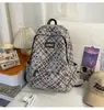 Mochila Texturizada con Patrón de Cuadros Estrella Rosa-Marrón Teñida con Niebla, con un Estilo Genial para Niñas, Mochila Ligera para Clases Diarias y Compras