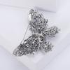 Retro Palace estilo borboleta broche oco diamante borboleta broche xale pino fixo anti-luz