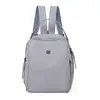 Mochila pequeña moderna y suave para mujer, mochila de doble hombro de tela de nailon ligera, nuevo modelo 2026 para viajes y desplazamientos