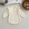 Novo macacão infantil para outono e inverno, 100% algodão puro, tricotado com um doce design de laço, suéter infantil em estoque