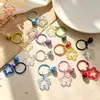Llavero Anillo con Abalorio Estrella Acrílico Transparente de Colores Lindo Timbre Colgante DIY para Mochila