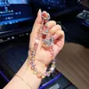 Llavero de coche con cadena de cristal facetado de mariposa de cristal muy elegante y único, correa de teléfono de moda y personalizada, accesorio para bolso