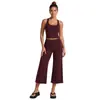 Conjunto de fitness transfronterizo con top de tirantes anchos para yoga, conjunto de pantalones capri de running para fitness que absorben la humedad y se secan rápidamente