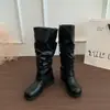 Botas largas de diseño otoño-invierno 2026, punta redonda, caña alta, nicho, pantorrilla ancha, por encima de la rodilla, botas de jinete, botas apiladas