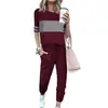 D9389 Venta caliente de Amazon moda casual europea y americana para mujer costura de color sólido conjunto de dos piezas de pantalones cortos de manga corta