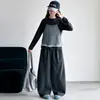 Conjunto de otoño para niñas 2026 nuevo estilo coreano a rayas de dos piezas con pantalones de pierna ancha de manga larga para niños mayores, ropa de otoño muy elegante