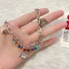 Colar Coração Arco-Íris de Pérolas Dopamina Doce e Descolado Moda Feminina Estiloso High-End Hip-Hop Camada Dupla Coração de Pêssego Acessórios para Clavícula