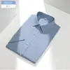 Camisa de hombre de manga corta estilo business casual en tejido Oxford lavado con enzimas, camisa con cuello lavado con enzimas para el trabajo de campo y para ir al trabajo