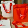 Embalagens Promocionais Corporativas Personalizadas para Bolsas e Roupas de Alto Padrão Sacos de Papel para Presente Sacos de Papel para Perfumes e Produtos de Cuidados com a Pele de Grandes Marcas Logo