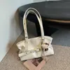 Bolsa tote de grande capacidade para mulheres, estilo casual, novo modelo 2026, bolsa de ombro e de axila, bolsa de nicho de alta qualidade