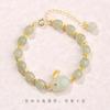 Pulsera de conejo blanco y verde imitación jade Hetian natural pulsera de conejo para mujer verano lujo ligero ins minoritario jade cuerda de mano