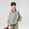 Otoño 2026 Nuevo Estilo Versión Coreana Moda Sudaderas con Capucha de Cuadros y Parches Falsas de Dos Piezas Personalidad para Niños POLO