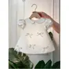 Vestido estiloso de alta qualidade para o primeiro aniversário de criança 2026 novo modelo florista bebê menina cetim vestido princesa para verão