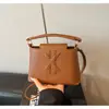 Atacado transfronteiriço dropshipping 2026 nova moda bolsa de mão grande capacidade com textura fosca boné marca L estilo coreano bolsa de mão feminina