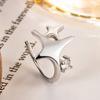 Clip para oreja de cuatro estrellas incrustado con diamantes diseño de nicho clip para oreja sin agujeros en las orejas estrella pequeña estilo dulce fresco versátil hombres y mujeres pueden usar