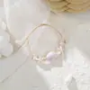 Origen y procedencia de las mercancías: Pulsera de Cerámica Tejida, Diseño de Nicho, Sensación de Alta Gama, Dulce y Versátil para Mujeres, Pulsera Artística de Concha Marina
