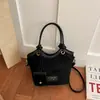 Bolso de mano de mujer de alta gama, nicho, estilo vintage, de importación, nuevo bolso de hombro de moda 2026, bandolera tipo cubo versátil