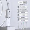Venta al por mayor de fábrica portátil eléctrico telescópico raspador dental limpiador dental cuidado bucal spray de agua