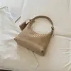 Bolso de mano de color liso con diseño único y patrón tejido, alta estética, simple y elegante para el trabajo y los desplazamientos, de hombro y de mano