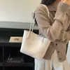 Bolso de mano vintage estilo coreano para mujer, nuevo modelo 2026, adecuado para el trabajo y los desplazamientos, bolso de hombro elegante y versátil, bolso de axila
