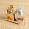 Suministro transfronterizo de bolsas de tela dorada y plateada bolsa de tela rojo dorado joyería joyería texto juego regalo bolsas de embalaje de almacenamiento en stock
