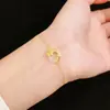 Pulsera Hebilla de Paz Flor de Loto Dorada Modelo Nuevo 2026 Lujo Ligero Elegante Exquisito Diseño de Nicho Pulsera Joyería