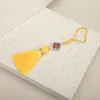 6CM trébol de cuatro hojas borla fuzi borla marcapáginas oreja colgante colgante de joyería caja de regalo accesorios colgantes grandes precio excelente