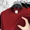 Camiseta de algodón puro de manga corta para verano para hombre, transpirable y de corte holgado, camiseta de cuello redondo para jóvenes y adultos de mediana edad, top versátil y moderno de color liso