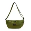 Bolsa de nicho linda y versátil para mujer, nueva versión coreana, bolso de mujer simple de gran capacidad, bolso cruzado de lona moderno para estudiante