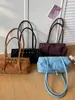 Moda Retro Transfronteriza Versátil Otoño/Invierno 2026 Bolso Suave de Gamuza Nuevo Bolso de Mano Casual Bolso de Axila de Nicho