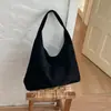 Bolso de hombro para mujer estilo coreano transfronterizo estilo universitario, bolso tote casual nuevo con diseño calado, bolso simple de gran capacidad para el día a día, para llevar debajo del brazo