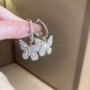 Pendientes de plata con forma de mariposa y flor de perla retro francesa, pequeños y exquisitos, de alta gama, con diseño de hada súper dulce para mujer.