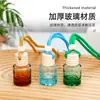 Botella de ambientador de coche de colores con cordón, colgante de perfume pequeño para ventilación de coche, botella difusora mini para espejo retrovisor