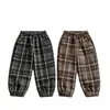 Pantalones de Forro Polar para Niños Nuevos de Otoño e Invierno Pantalones Casuales para Niños Sueltos Atractivos Estilo Coreano Cuadros Pantalones Deportivos Joggers Comercio Exterior