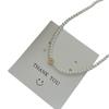 Collar de perlas con diseño de margaritas para mujer, cadena de clavícula con un toque de lujo y un diseño de nicho, collar de gran sentido 2023.